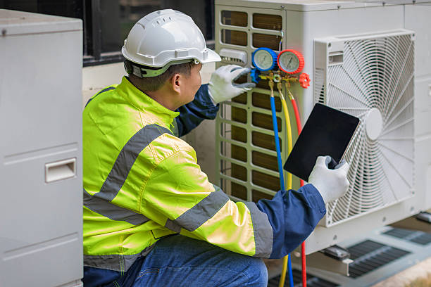 Professional Heat Pump Repair technician working in Manson, NC